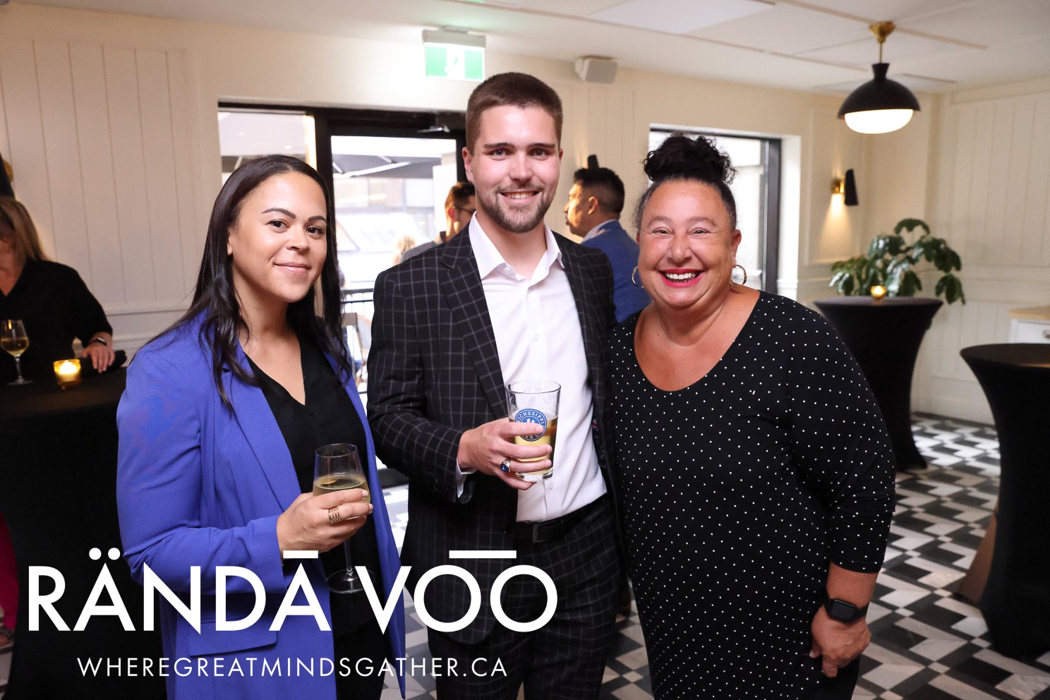 Three guests together with drinks at The Metcalfe Hotel.