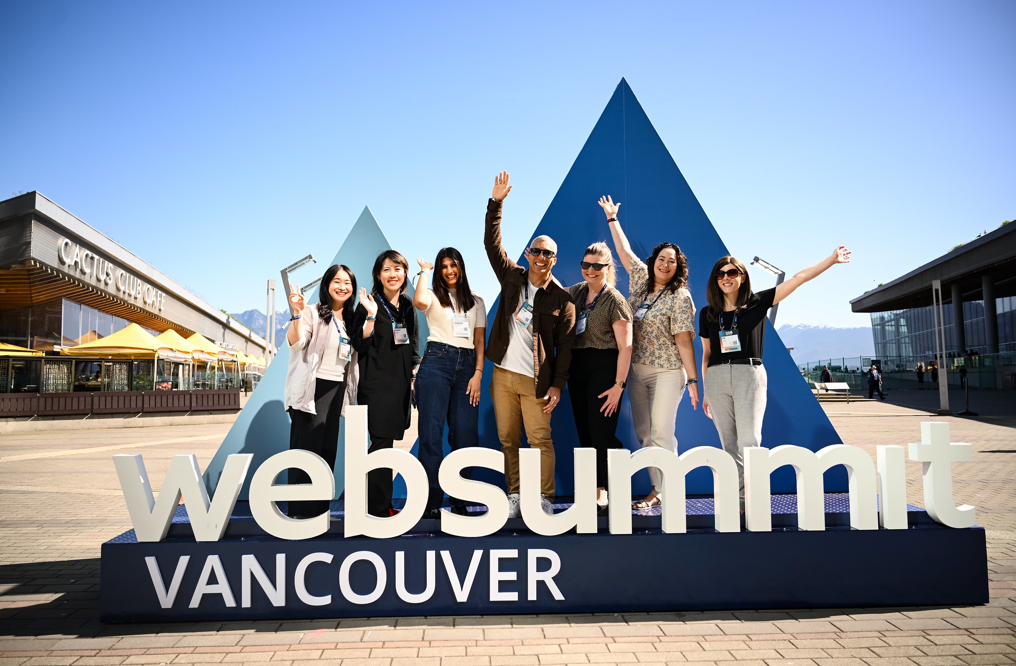 Attendees posing beside the Web Summit Vancouver sign during the 2025 event.