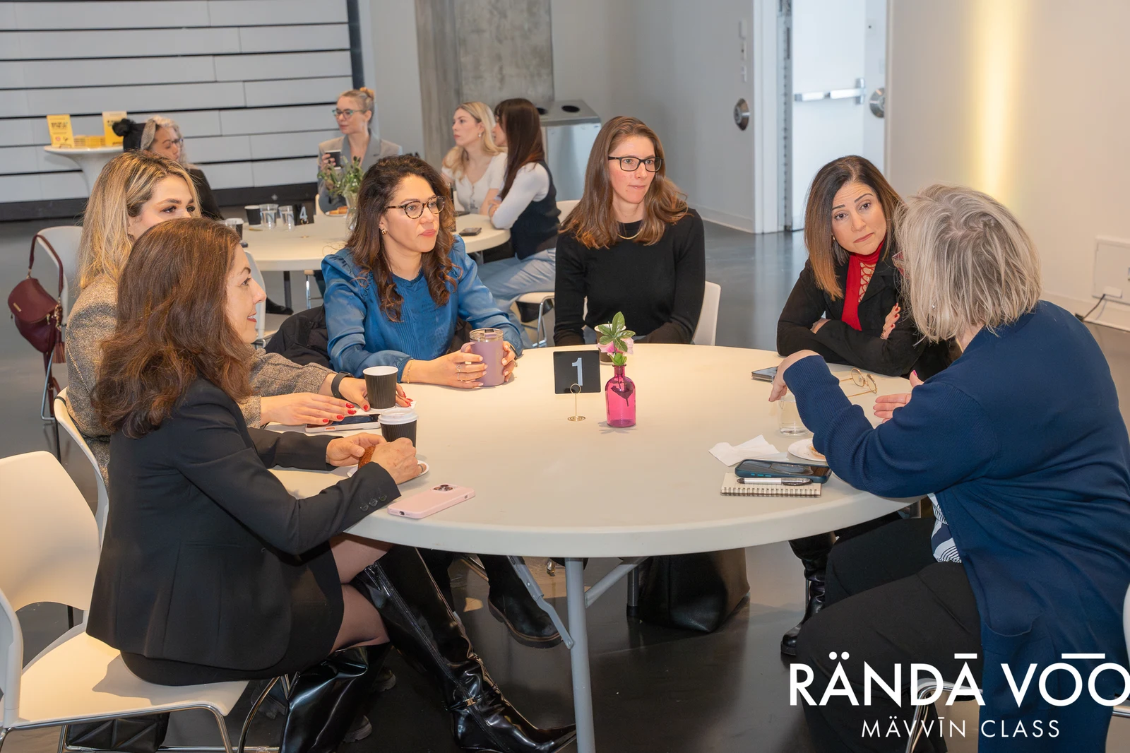 MÄVVĪNCLASS participants listening to a fellow attendee during a round-table discussion.