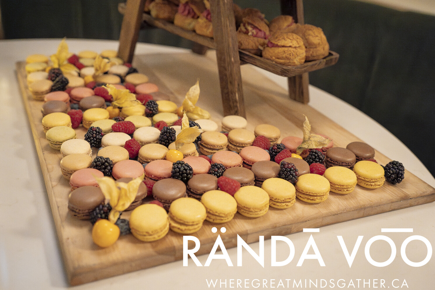 Colourful macarons and berries displayed at the Tour Du RÄNDĀ VO͞O grand finale.