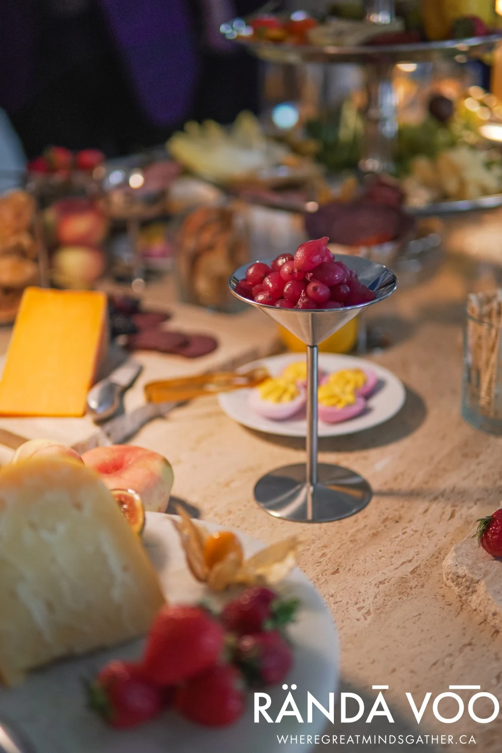 Grapes, cheese, and other food arranged on the grazing table at Parlour.